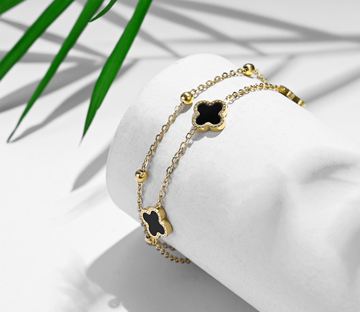 Lắc chân nữ titan 2 tầng hoa 4 cánh LV màu vàng 24k