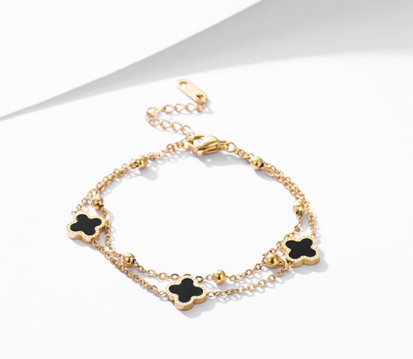 Lắc chân nữ titan 2 tầng hoa 4 cánh LV màu vàng 24k