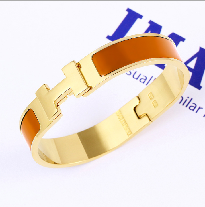 Vòng tay titan thời trang Hermes chữ H màu cam