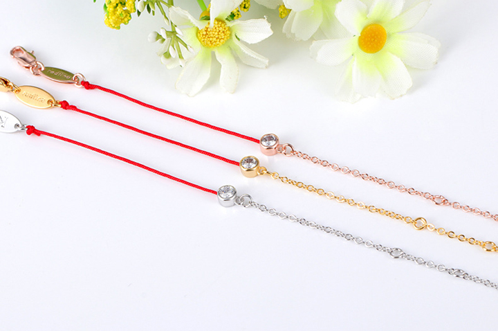 TA233B-Lắc tay titan chỉ đỏ may mắn