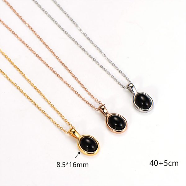 TN730g-Dây chuyền nữ titan mặt hình ô van màu đen