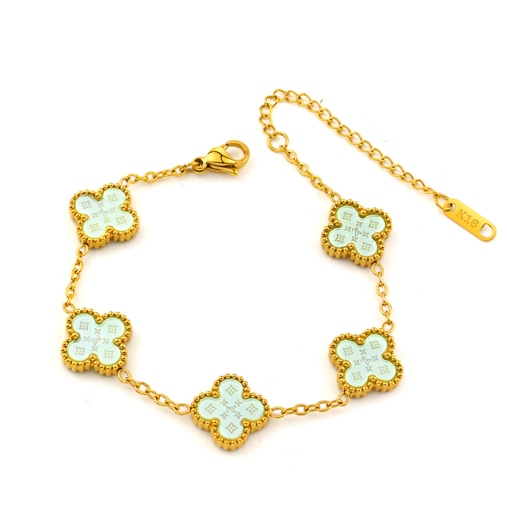 TA493c Lắc tay van cleef hoa 4 cánh nền màu xanh ngọc