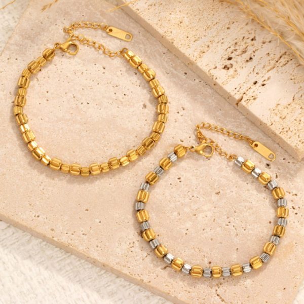 TA092a Lắc tay nữ bi titan chạm bánh răng