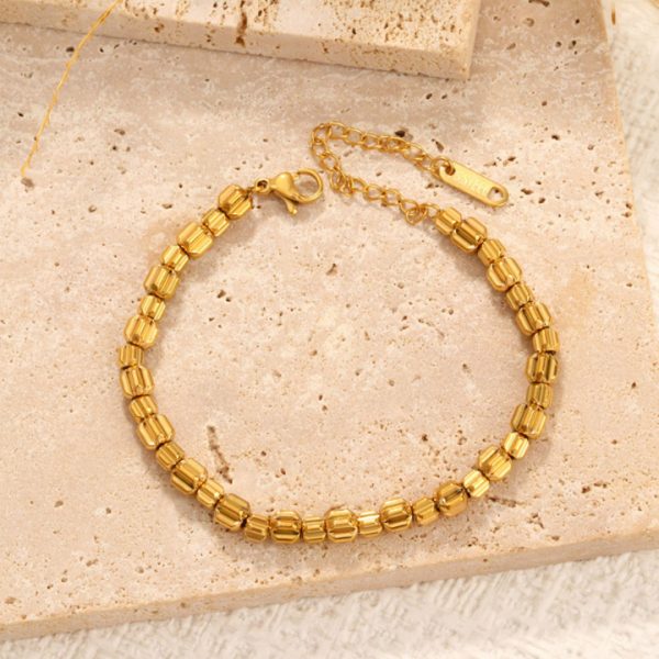 TA092b Lắc tay nữ bi titan chạm bánh răng