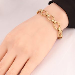 TA309b Lắc tay nữ titan khoen ovan xoắn màu vàng