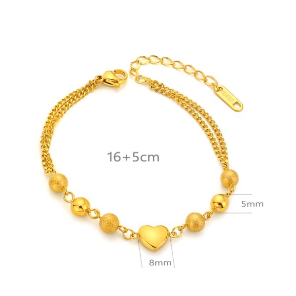 TA327a Lắc tay nữ titan trái tim cách điệu bi tròn