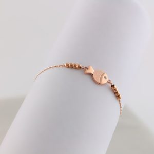 TA094b Lắc tay titan con cá phun cát màu vàng hồng