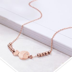TA094c Lắc tay titan con cá phun cát màu vàng hồng