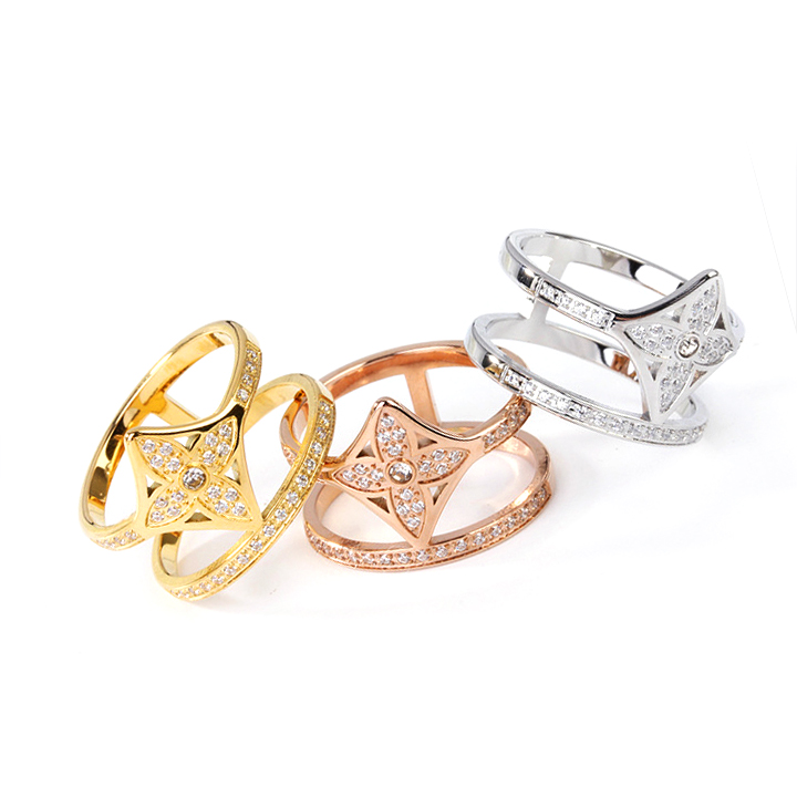 TC046a Nhẫn nữ titan thời trang LV đính kim đóng