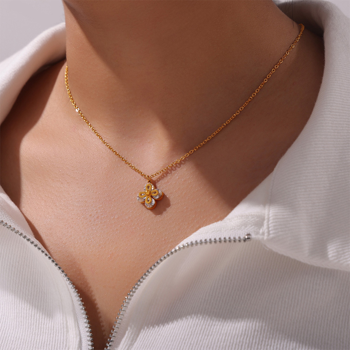 TN132h Dây chuyền titan hoa 4 cánh kẹp hột đá