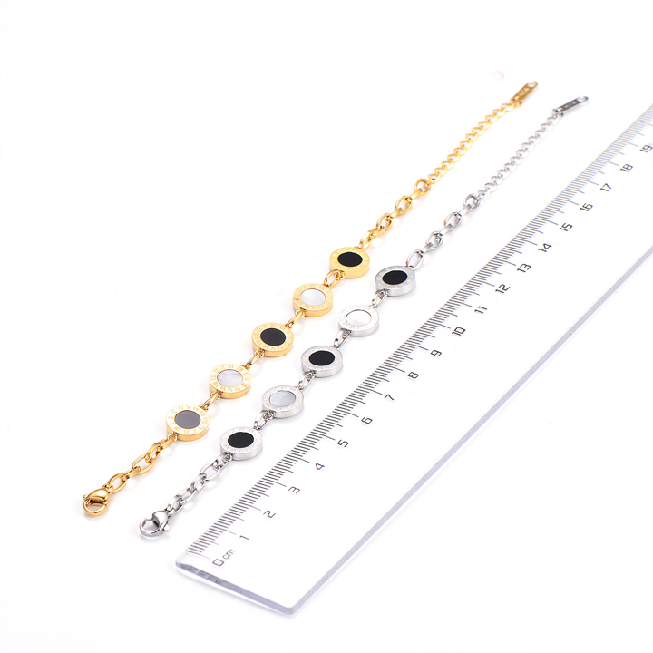 TA128d Lắc tay nữ titan mặt tròn số la mã cách điệu