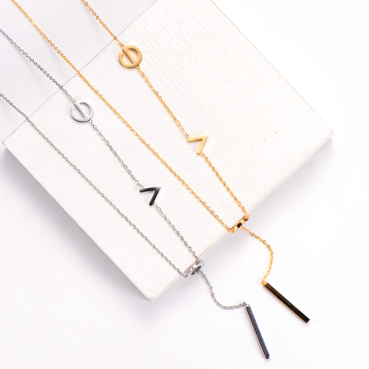 TN066a Dây chuyền nữ titan chữ love cách điệu