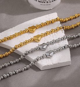 TA662g Lắc tay bi titan trái tim cách điệu bi móc máy