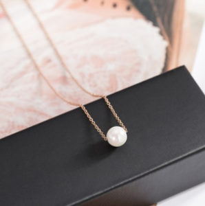 Dây chuyền vòng cổ titan ngọc trai xỏ ngang