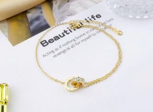 Lắc chân titan 2 khoen tròn số la mã màu vàng 24k