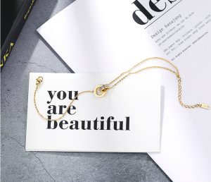 Lắc chân titan 2 khoen tròn số la mã màu vàng 24k