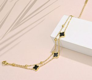 Lắc chân nữ titan 2 tầng hoa 4 cánh LV màu vàng 24k