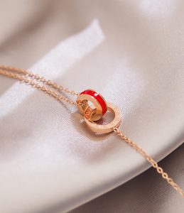 Lắc chân titan khoen tròn so la mã đá đỏ