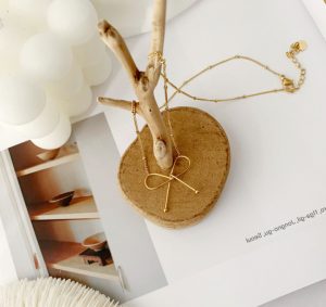Dây chuyền titan hình cái chiếc nơ