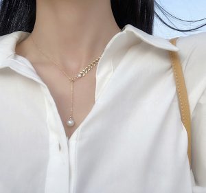 Dây chuyền titan đuôi cá cách điệu ngọc trai