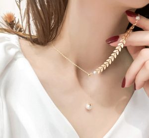 Dây chuyền titan đuôi cá cách điệu ngọc trai