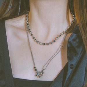 Dây chuyền titan trái tim mũi tên phong cách Hiphop