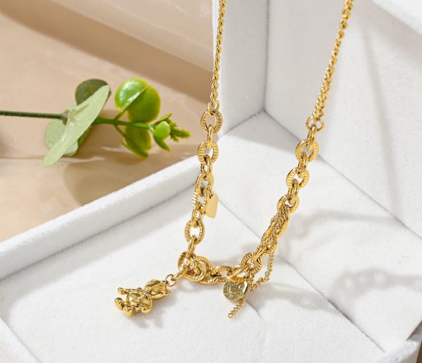 Dây chuyền titan con gấu phong cách mới mạ vàng 24k