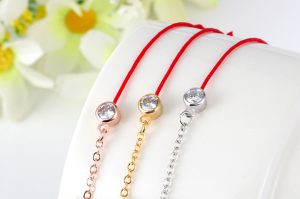TA233c-Lắc tay titan chỉ đỏ may mắn