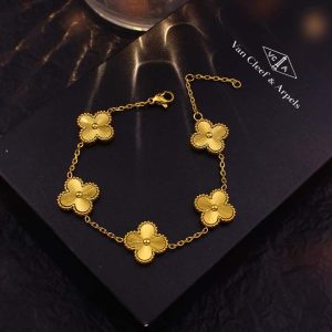 TA243g-Lắc tay nữ titan hoa 4 canh van Cleef chạm móc máy