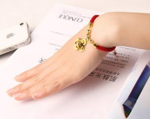 TA293d-Lắc tay titan chỉ đỏ hoa trà
