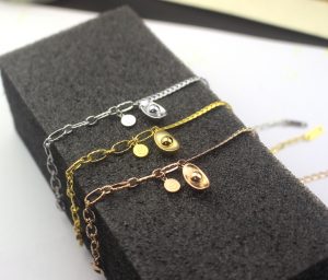 Lắc tay titan đồng tiền ngân lượng