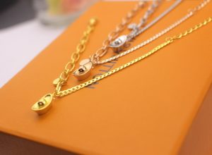 Lắc tay titan đồng tiền ngân lượng