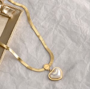 Dây chuyền titan trái tim đính ngọc trai