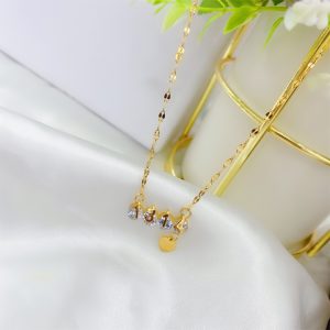 Dây chuyền titan 1314 kẹp đá mạ vàng