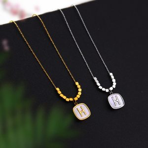 TN670b-Dây chuyền titan mặt chữ H nền xà cừ