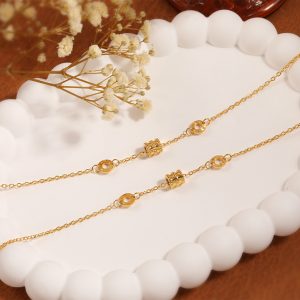 TA658c-Lắc chân titan ống tròn nhỏ số la mã hiệu BVL