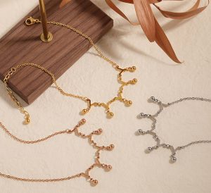 TA679f-Lắc chân nữ titan bi cách điệu