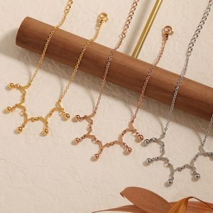 TA679g-Lắc chân nữ titan bi cách điệu