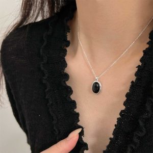 TN730e-Dây chuyền nữ titan mặt hình ô van màu đen