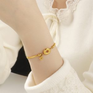 TA197e-Lắc tay nữ titan đồng tiền chữ phúc kim tiền