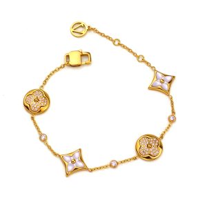 TA201b-Lắc tay nữ titan thời trang LV