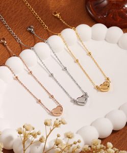 TA523g-Lắc chân nữ titan trái tim cách điệu bi