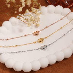 TA523j-Lắc chân nữ titan trái tim cách điệu bi