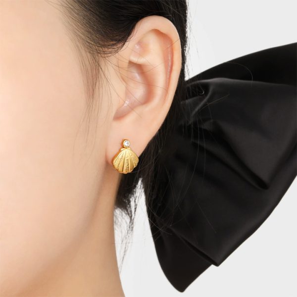TB283b-Bông hoa tai nữ titan hình vỏ con xò