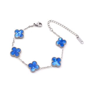 TA486d Lắc tay van cleef hoa 4 cánh nền màu xanh bầu trời