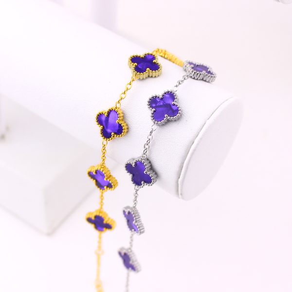 TA487b Lắc tay van cleef hoa 4 cánh nền màu tím