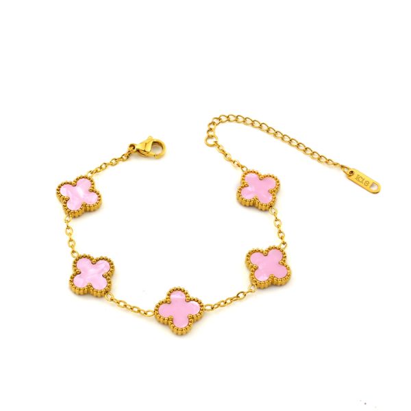TA491c Lắc tay van cleef hoa 4 cánh nền màu hồng nhạt