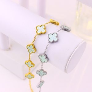 TA493b Lắc tay van cleef hoa 4 cánh nền màu xanh ngọc