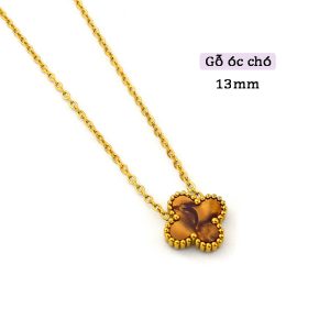 TN814b-Dây chuyền titan hoa 4 cánh van cleef nền màu gỗ óc chó