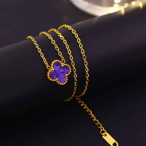 TN840c Dây chuyền titan hoa 4 cánh van cleef nền màu tím
